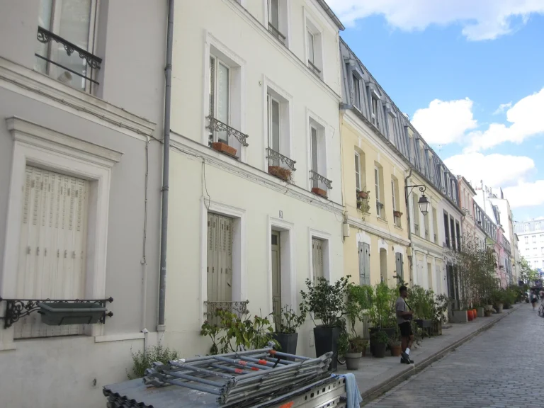 Budget hotels in Paris: the colourful houses of Rue Crémieux in the 12th