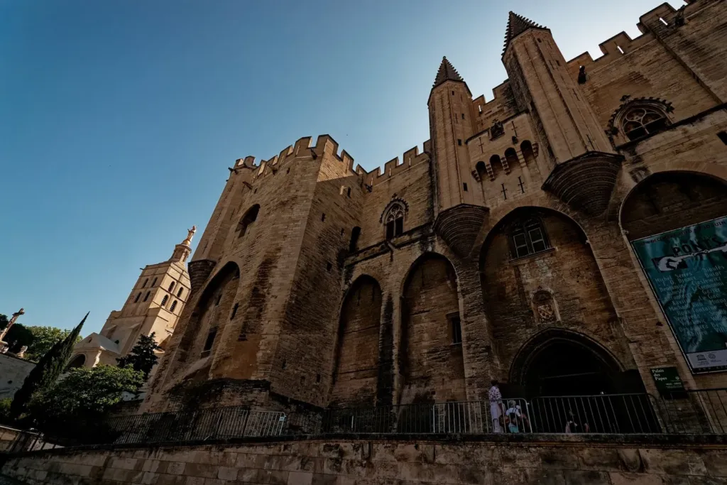 Things to do in Avignon: the Palais des Papes on the Place du Palais
